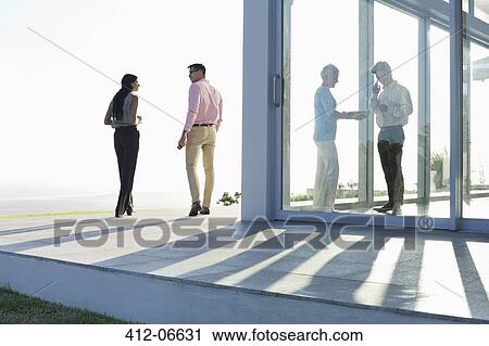 Business people talking outside office View Large Photo Image Stock Image - Business people talking outside office. Fotosearch