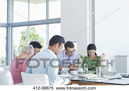 Business people working in meeting View Large Photo Image Stock Photography - Business people working in meeting. Fotosearch