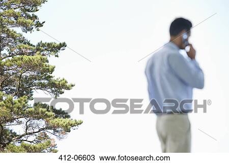 Reflection of businessman in still pool outdoors View Large Photo Image Stock Image - Reflection of businessman in still pool outdoors. Fotosearch