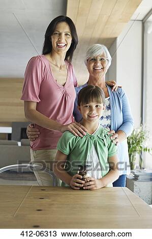 Three generations of women smiling together View Large Photo Image Stock Image - Three generations of women smiling together. Fotosearch