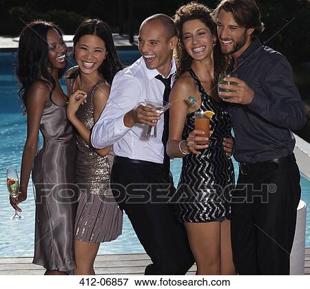 Stock Photo - Friends laughing at party. Fotosearch