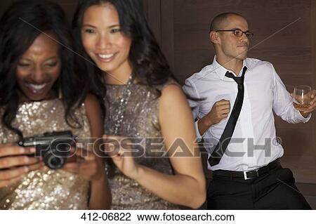 Man dancing at party View Large Photo Image Stock Image - Man dancing at party. Fotosearch