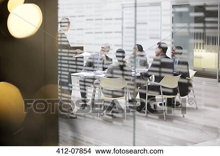 Business people meeting in conference room View Large Photo Image Picture - Business people meeting in conference room. Fotosearch