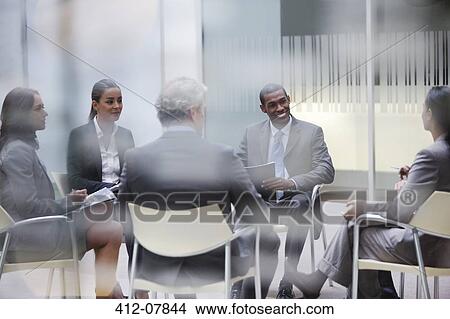Picture - Business people meeting in office. Fotosearch