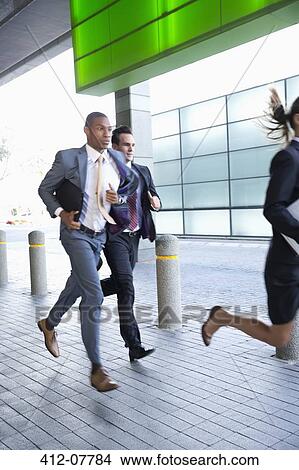 Business people running View Large Photo Image Picture - Business people running. Fotosearch