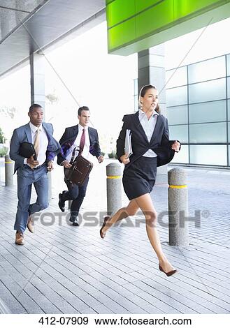 Stock Photo - Business people running. Fotosearch