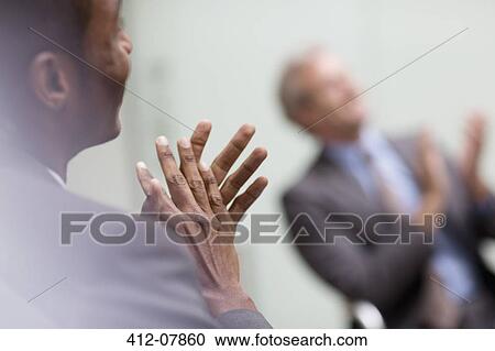 Businessmen clapping in meeting View Large Photo Image Stock Image - Businessmen clapping in meeting. Fotosearch