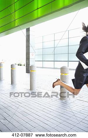 Businesswoman running View Large Photo Image Stock Photo - Businesswoman running. Fotosearch