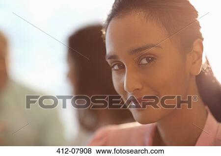 Close up portrait of smiling businesswoman View Large Photo Image Stock Photo - Close up portrait of smiling businesswoman. Fotosearch