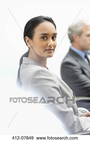 Stock Photo - Portrait of confident businesswoman. Fotosearch