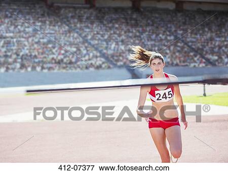 High jumper nearing pole View Large Photo Image Stock Photo - High jumper nearing pole. Fotosearch