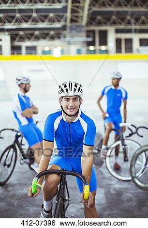 Stock Photograph - Portrait of track cyclist in velodrome. Fotosearch