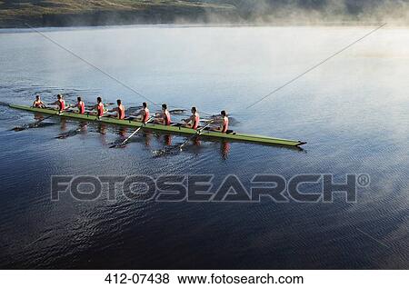Rowing crew rowing scull on lake View Large Photo Image Stock Photo - Rowing crew rowing scull on lake. Fotosearch