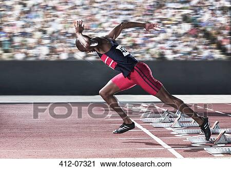 Sprinter taking off from starting block on track View Large Photo Image Stock Image - Sprinter taking off from starting block on track. Fotosearch