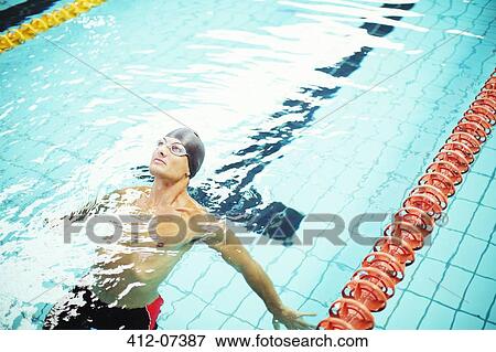 Swimmer on back in pool View Large Photo Image Stock Photo - Swimmer on back in pool. Fotosearch