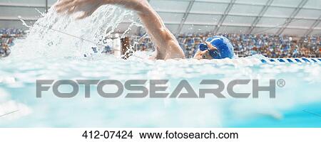 Swimmer racing in pool View Large Photo Image Picture - Swimmer racing in pool. Fotosearch