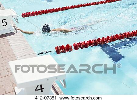 Swimmer touching edge of pool View Large Photo Image Stock Image - Swimmer touching edge of pool. Fotosearch