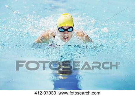 Swimmer wearing goggles in pool View Large Photo Image Stock Image - Swimmer wearing goggles in pool. Fotosearch