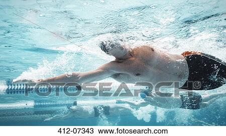 Swimmers racing in pool View Large Photo Image Stock Image - Swimmers racing in pool. Fotosearch