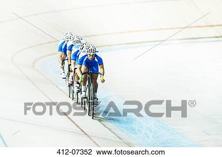 Track cycling team riding in velodrome View Large Photo Image Stock Image - Track cycling team riding in velodrome. Fotosearch