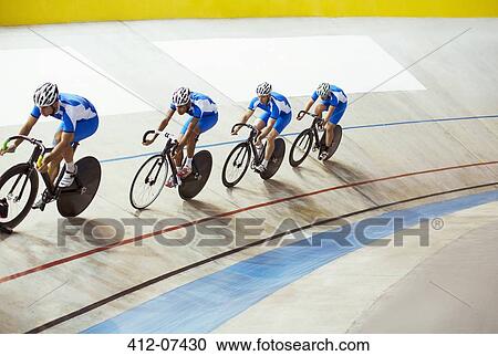 Track cycling team riding in velodrome View Large Photo Image Stock Image - Track cycling team riding in velodrome. Fotosearch
