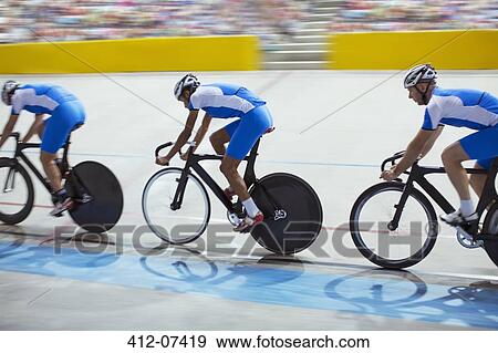 Track cycling team riding in velodrome View Large Photo Image Stock Photo - Track cycling team riding in velodrome. Fotosearch