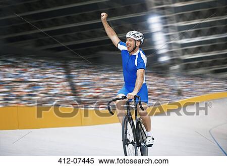 Track cyclist celebrating in velodrome View Large Photo Image Stock Photography - Track cyclist celebrating in velodrome. Fotosearch