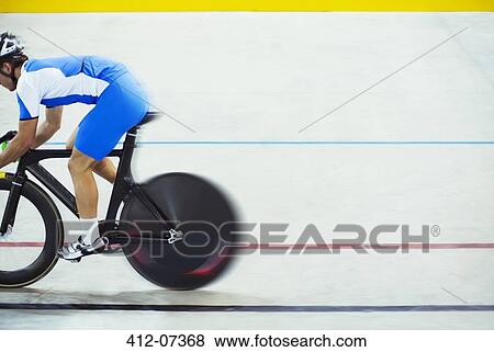 Track cyclist riding in velodrome View Large Photo Image Stock Photo - Track cyclist riding in velodrome. Fotosearch