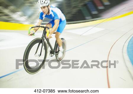 Track cyclist riding in velodrome View Large Photo Image Stock Photography - Track cyclist riding in velodrome. Fotosearch