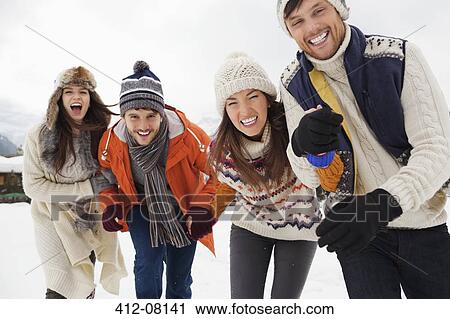 Portrait of enthusiastic friends in snow View Large Photo Image Stock Image - Portrait of enthusiastic friends in snow. Fotosearch