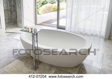 Picture - Bathtub in modern bathroom. Fotosearch