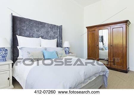 Bed in luxury bedroom View Large Photo Image Stock Image - Bed in luxury bedroom. Fotosearch
