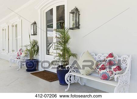 Bench with cushions on porch View Large Photo Image Stock Photograph - Bench with cushions on porch. Fotosearch