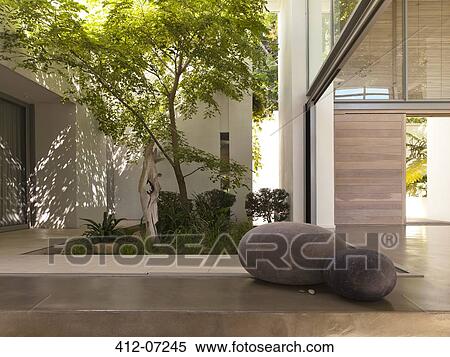 Courtyard of modern house View Large Photo Image Stock Photography - Courtyard of modern house. Fotosearch