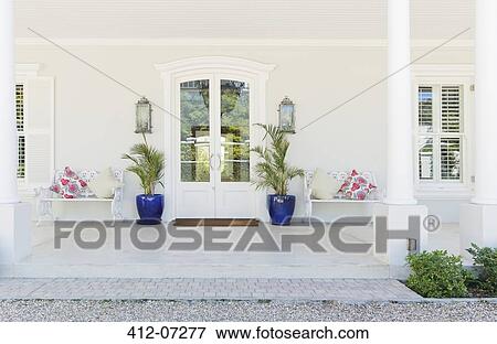 Entrance on porch of luxury house View Large Photo Image Stock Photo - Entrance on porch of luxury house. Fotosearch