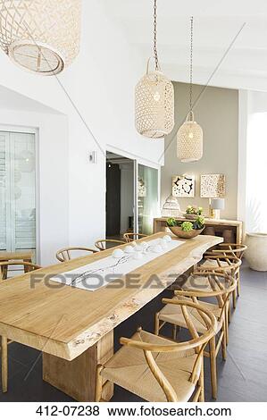 Lanterns hanging over wooden table View Large Photo Image Stock Photo - Lanterns hanging over wooden table. Fotosearch