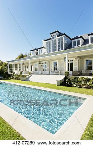 Luxury house, porch and swimming pool View Large Photo Image Stock Photo - Luxury house, porch and swimming pool. Fotosearch