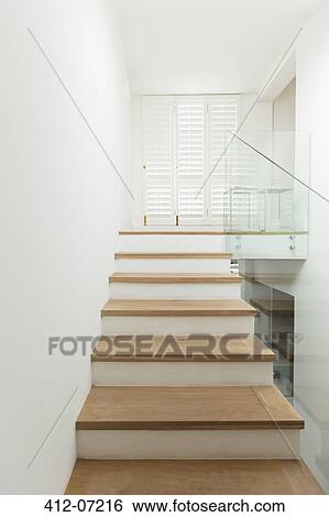 Stock Photograph - Stairs in modern house. Fotosearch