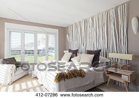 Stock Photograph - Sunlight in modern bedroom. Fotosearch