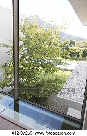 Stock Photo - View of swimming pool and mountain. Fotosearch