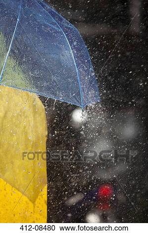 Close up of woman under umbrella in rain View Large Photo Image Stock Image - Close up of woman under umbrella in rain. Fotosearch