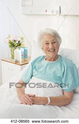 Portrait of smiling aging patient in hospital bed View Large Photo Image Stock Photography - Portrait of smiling aging patient in hospital bed. Fotosearch