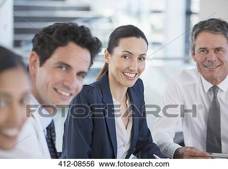 Portrait of smiling doctors and business people View Large Photo Image Stock Photograph - Portrait of smiling doctors and business people. Fotosearch