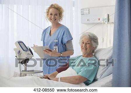 Portrait of smiling nurse and senior patient in hospital room View Large Photo Image Stock Image - Portrait of smiling nurse and senior patient in hospital room. Fotosearch