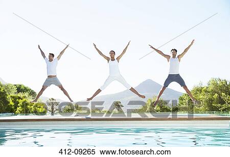 People jumping with arms and legs outstretched at poolside View Large Photo Image Stock Photography - People jumping with arms and legs outstretched at poolside. Fotosearch