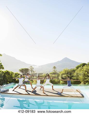 People practicing yoga at poolside View Large Photo Image Stock Image - People practicing yoga at poolside. Fotosearch