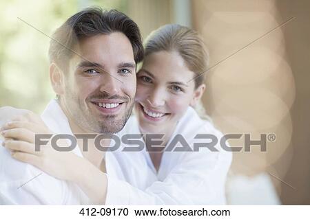 Portrait of smiling couple in bathrobes View Large Photo Image Stock Image - Portrait of smiling couple in bathrobes. Fotosearch
