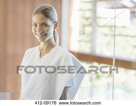 Portrait of smiling masseuse in spa View Large Photo Image Stock Photograph - Portrait of smiling masseuse in spa. Fotosearch