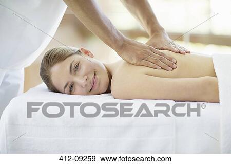 Woman having massage in spa View Large Photo Image Stock Photo - Woman having massage in spa. Fotosearch