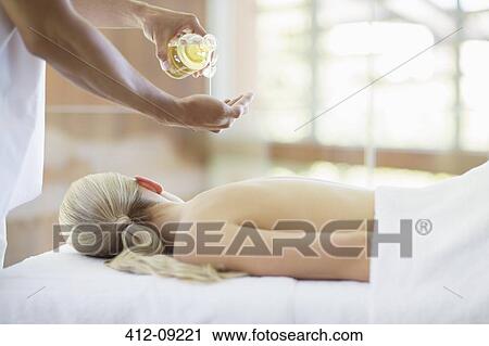 Woman receiving massage at spa View Large Photo Image Stock Image - Woman receiving massage at spa. Fotosearch